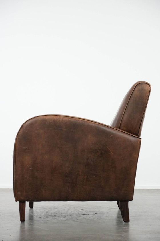 Image 1 of Poltrona in pelle di pecora dal design elegante e dalle belle forme rotonde