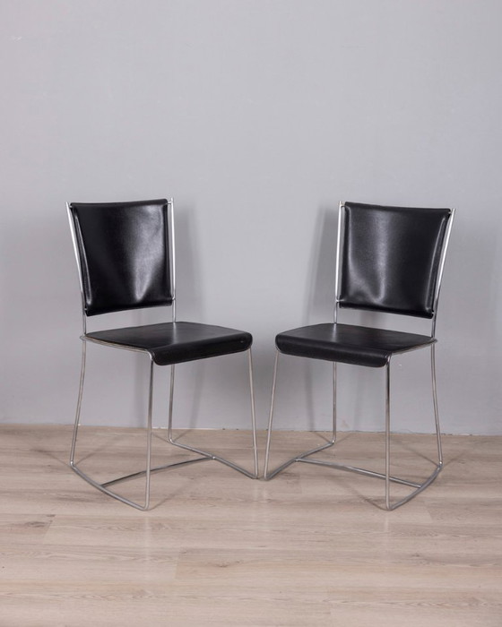 Image 1 of Een paar vintage leren stoelen uit de jaren 90, ontworpen door Segis Italia.