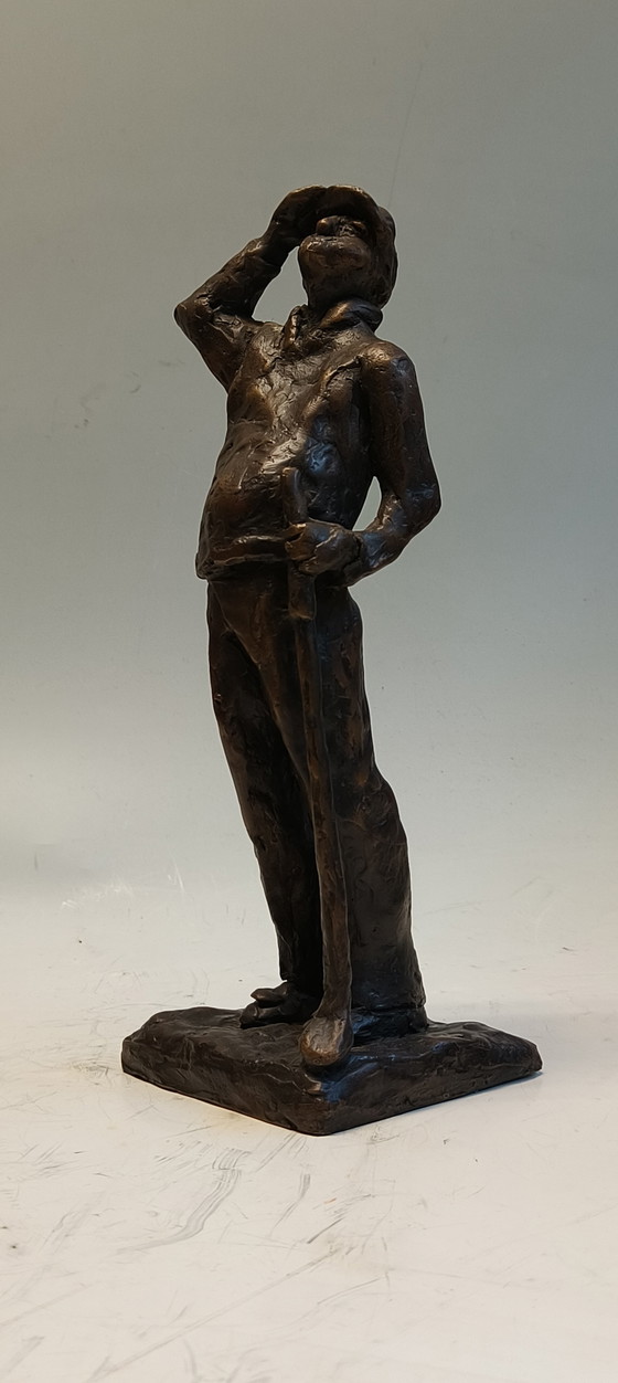 Image 1 of Image de sculpture en bronze et laiton représentant un golfeur, homme suivant