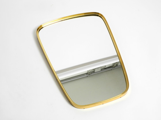 Image 1 of Magnifique miroir mural original du Mid Century Modern "Münchener Zierspiegel" avec cadre en laiton lourd