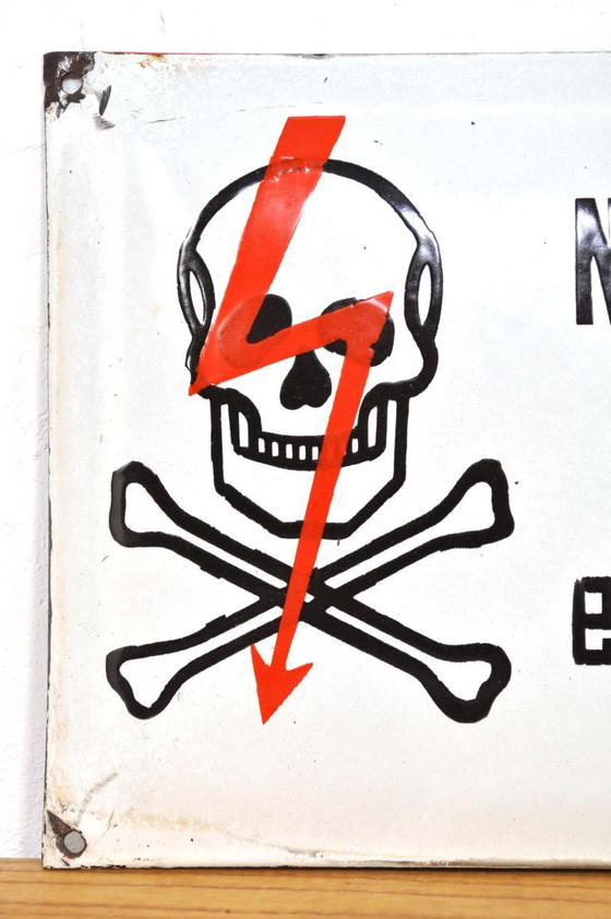 Image 1 of Enamel warning sign skull