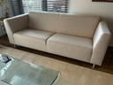 Beautiful 2.5-seater sofa in a light-colored fabric
