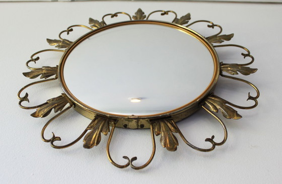 Image 1 of Sun mirror, “Witch’s Eye” in brass, attributed to Maison Deknudt.