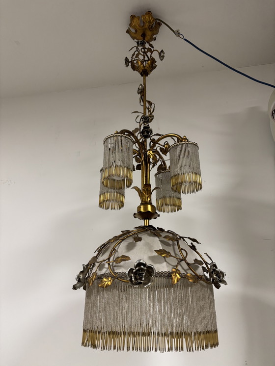 Image 1 of Exclusive chandelier with brass leaves and silver-colored roses