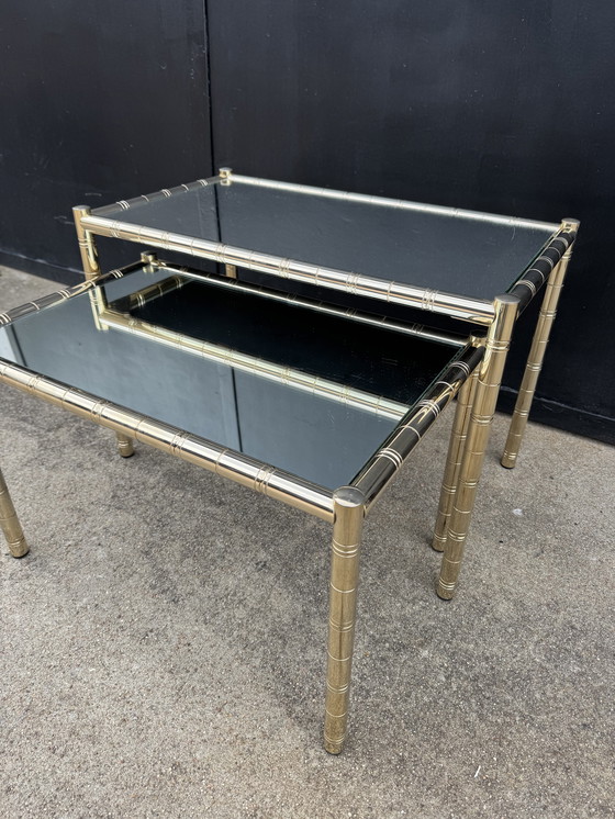 Image 1 of Nesting tables in gold-tone metal, bamboo, and mirror, 1970s style