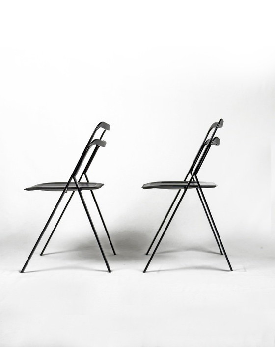 Image 1 of 4x Black metal and leather “Clio” folding chairs by Giorgio Cattelan