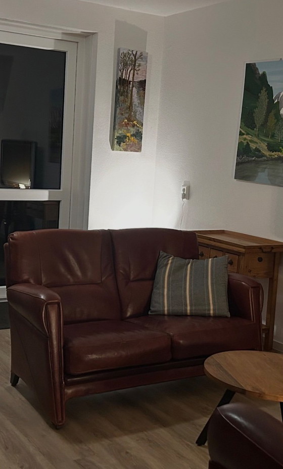 Image 1 of English-style leather seating area