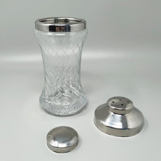 Image 1 of https://madinteriorart.com/collections/tableware/products/1950s-gorgeous-cut-crystal-cocktail-shaker-made-in-italy-copia