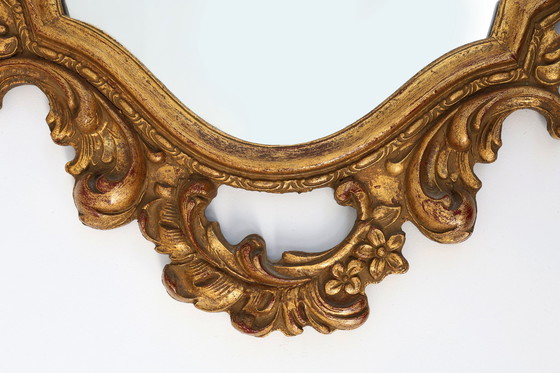 Image 1 of Baroque style oval wall mirror in gilded wood, France