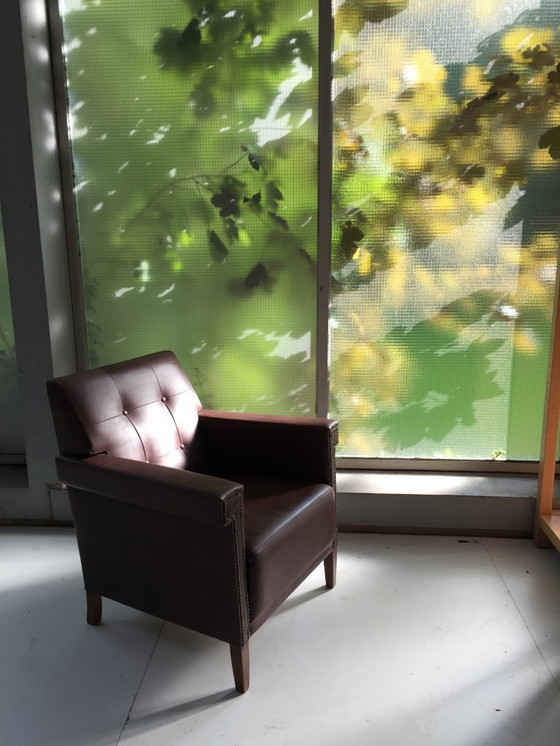 Image 1 of Unique "1930s armchair" with dark brown quality leather.