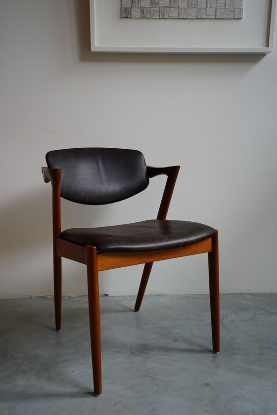 Image 1 of 6 Kai Kristiansen stoelen | Model 42 | Teak Leder patina