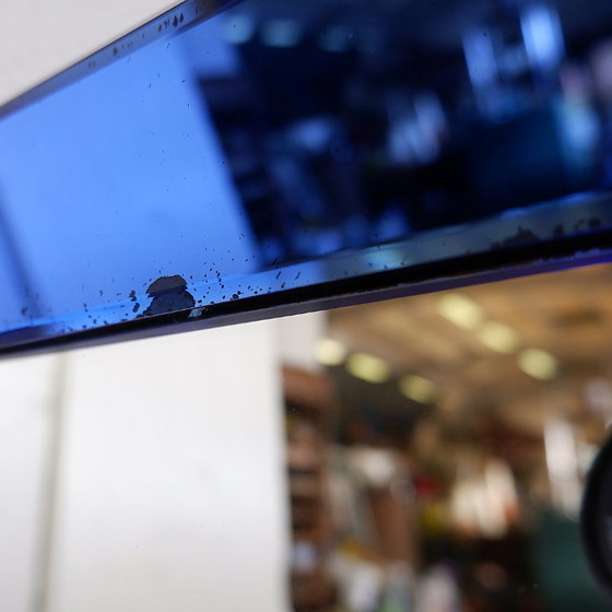 Image 1 of Mirror with a colored glass frame, attributed to Fontana Arte, Italy, circa 1950