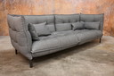 Sofá de tela gris B&B Italia diseño Husk