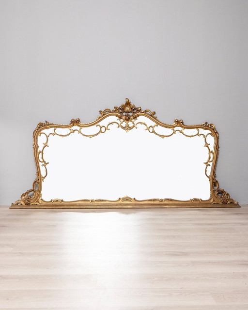 LARGE EARLY 20TH CENTURY BAROQUE STYLE GILDED WOOD WALL MIRROR