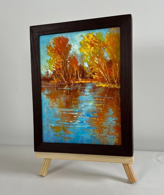 Image 1 of Origineel olieverfschilderij: Herfstlandschap aan een rivier, gouden weerspiegeling van het bos.