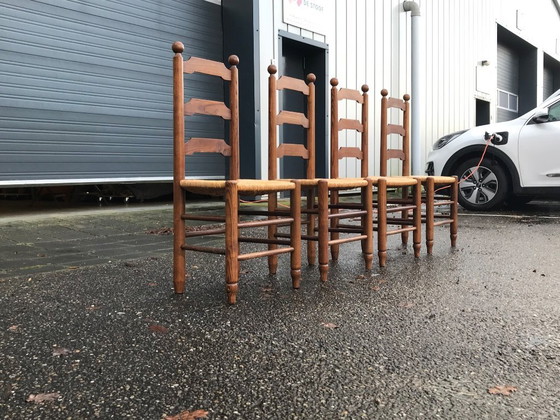 Image 1 of Esszimmerstühle aus Eiche und Geflecht Georges Robert France 1960s