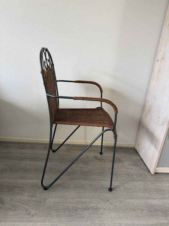 Image 1 of Set van 2 smeedijzeren stoelen met gevlochten rotan 