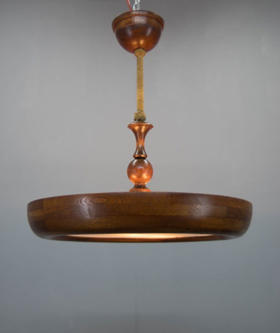 Image 1 of Grand lustre Art déco en bois en forme d'OVNI, années 1930