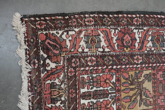 Image 1 of Tappeto orientale annodato a mano con bellissimi motivi tra cui dettagli rosa 312x220cm