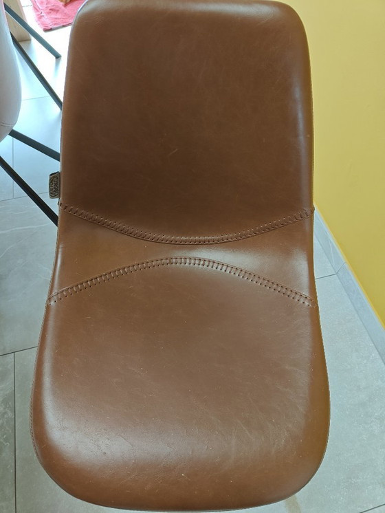Image 1 of 7 Dutchbone cognac chairs