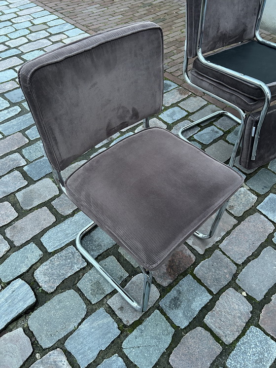 Image 1 of 8 sillas de tela acanalada pura con estructura tubular cromada