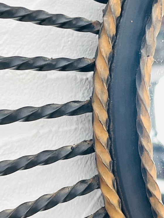 Image 1 of Specchio vintage anni '60 in metallo nero e oro con effetto sole