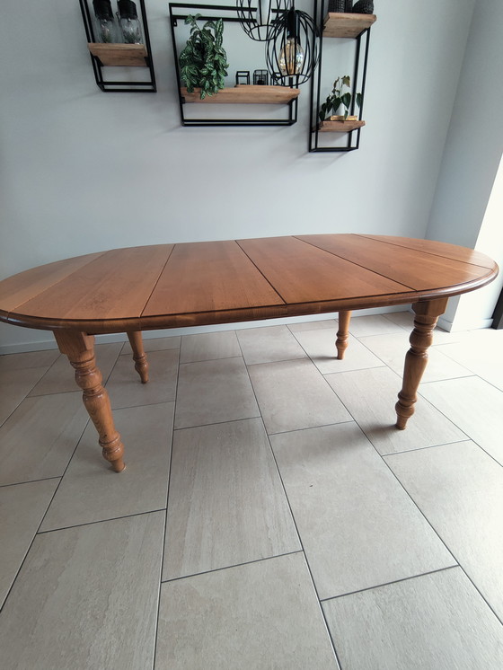 Image 1 of In large adjustable oak table