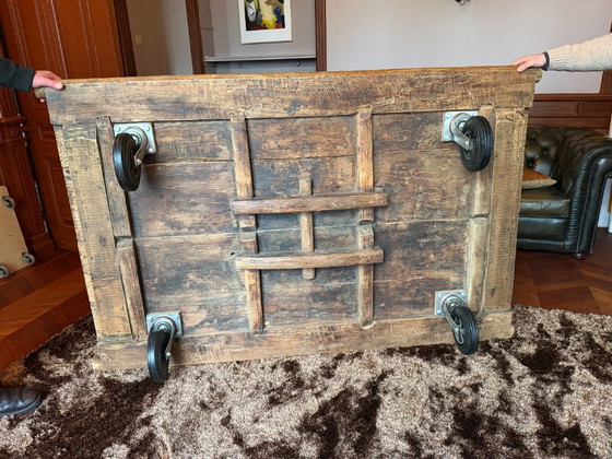 Image 1 of Unique industrial coffee table made of (monastery) wood on wheels