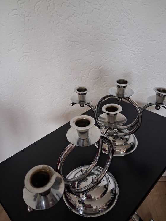 Image 1 of 2 three-armed candlesticks. Demeyere