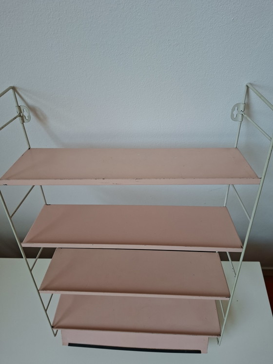 Image 1 of Raro estante de pared con la marca Tomado Holland
