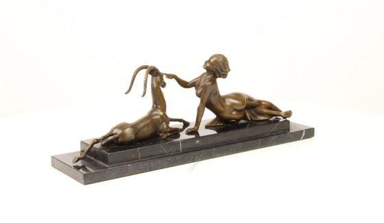 Image 1 of BRONZE STATUE OF AN AMAZON WITH ANTILOPE