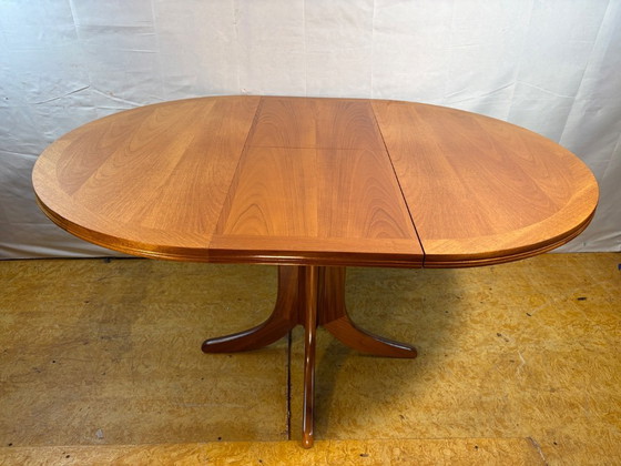Image 1 of Mid-Century Retro Vintage Teak Extending Round Dining Table by Parker Knoll – 1970.    Elegant|Space-Saving|Practical|Iconic Bri