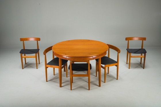 Image 1 of Mesa de comedor extensible y sillas danesas de teca de Hans Olsen para Frem Røjle, años 60, juego de 7