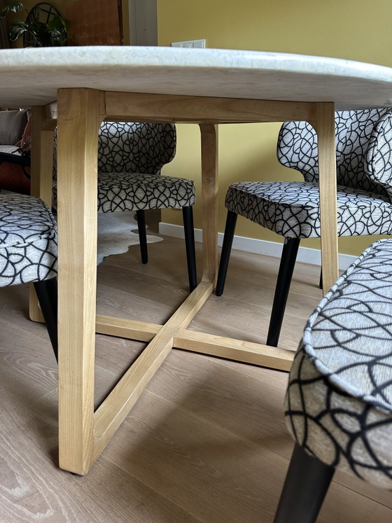Image 1 of Round travertine dining table