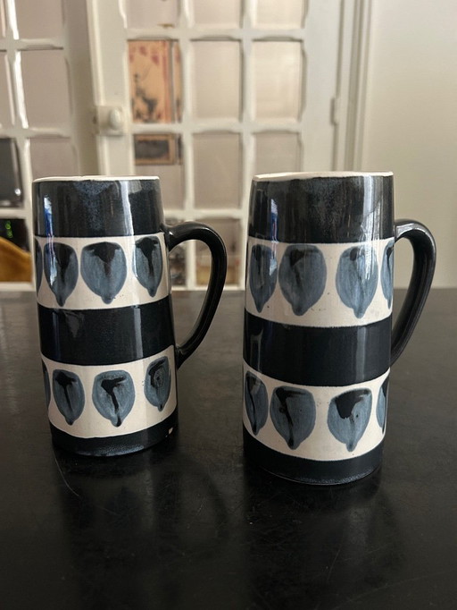 two vintage ceramic mugs