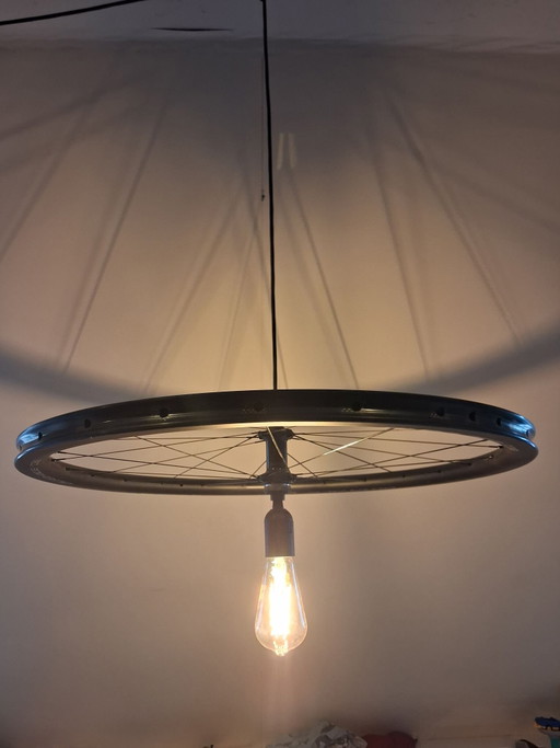 Lamp made from a carbon bicycle wheel