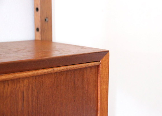 Sistema a parete Cadovius con scrivania segretario – Librerie, Legno (photo 5 of 11)