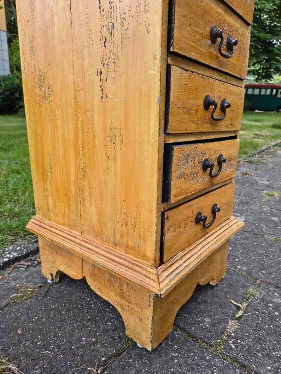 Image 1 of Vintage ochre yellow chest of drawers / apothecary
