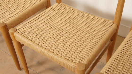 Image 1 of 4 chaises de salle à manger | Bramin | H.W. Klein | Chêne savonné | Restaurées