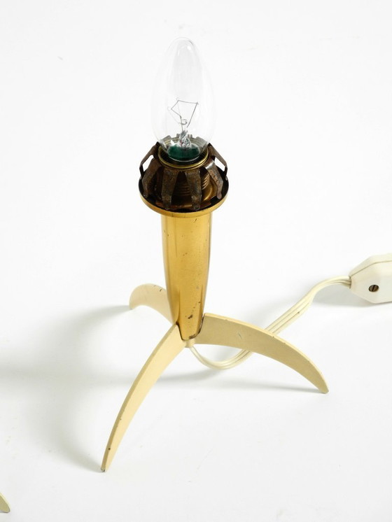 Image 1 of Two Mid-Century Modern rocket table lamps in brass and glass