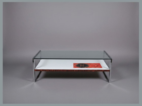 Image 1 of Mesa de centro Belarti con panel artístico de vidrio, cromo y cerámica.