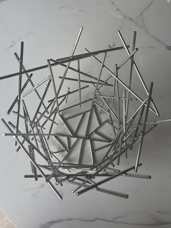 Image 1 of Corbeille Alessi esplode