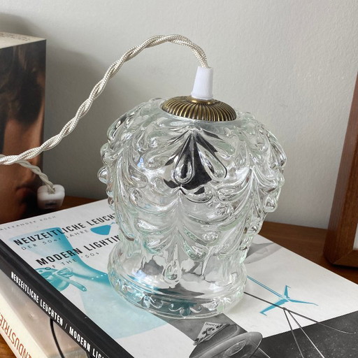 Lámpara portátil antigua de globo en vidrio transparente