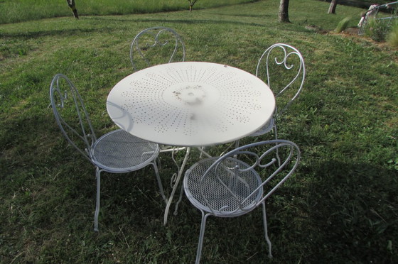 Image 1 of Vintage witte metalen tuintafel en stoelen