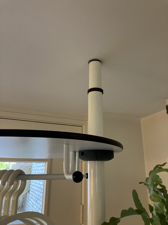 Image 1 of Designer coat rack, portable and height-adjustable so that it fits between ceiling and floor.