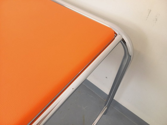 Image 1 of Vintage desk in orange imitation leather and chrome from the 1970s