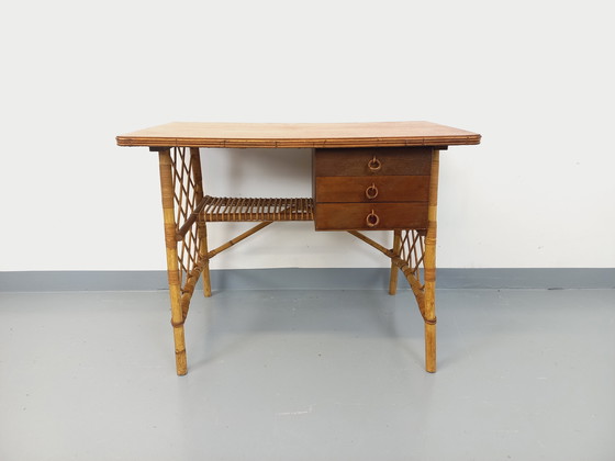 Image 1 of Vintage Louis Sognot bureau in rotan en hout uit de jaren 60