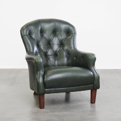 Fauteuil chesterfield en cuir de vachette vert de style anglais