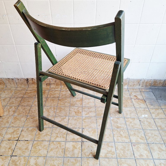 Image 1 of Sedia pieghevole vintage in legno con seduta in rattan