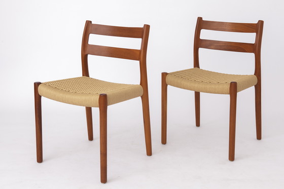 Image 1 of Set di 4 sedie modello 84 di Niels Otto Møller – Teak danese e corda di carta, anni '70 | Sedie da pranzo vintage in stile m